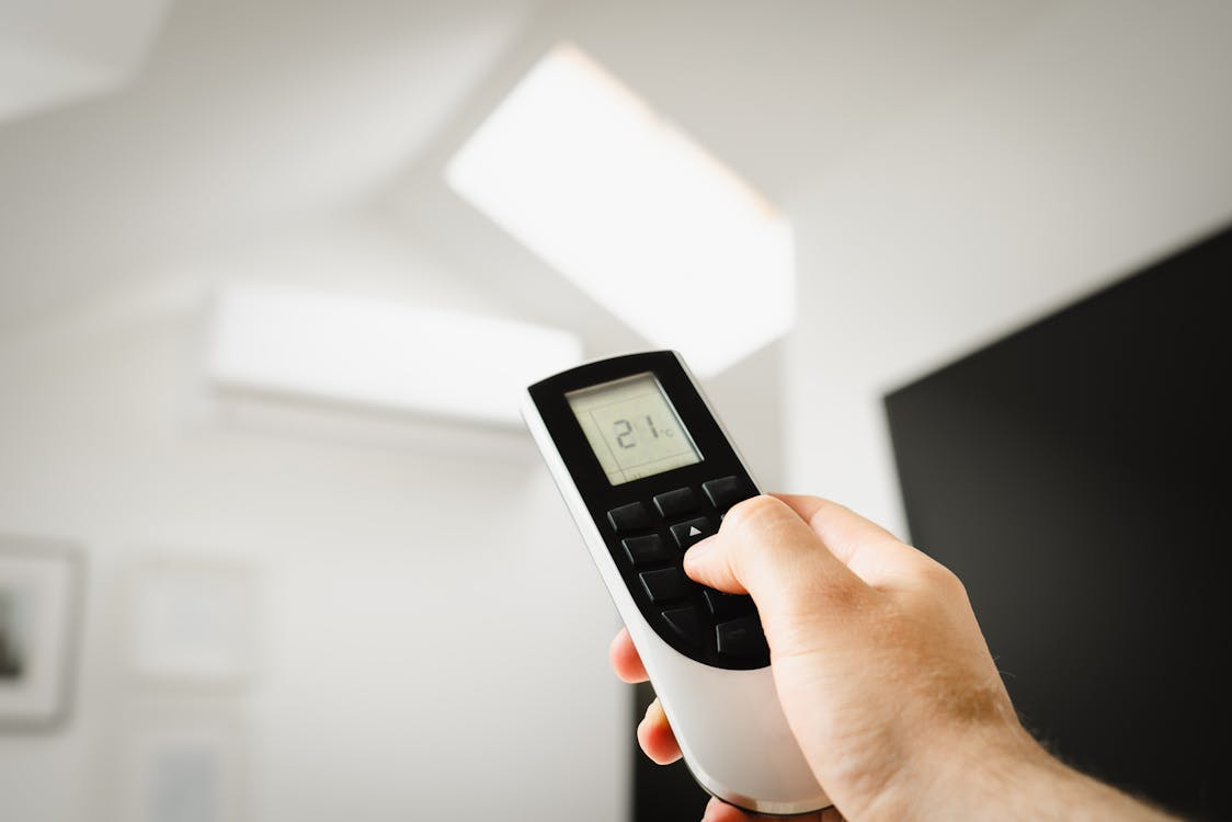 Adjusting an air conditioner remote to lower utility bills without sacrificing comfort.